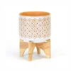 Cache-pot en céramique sur support en bois